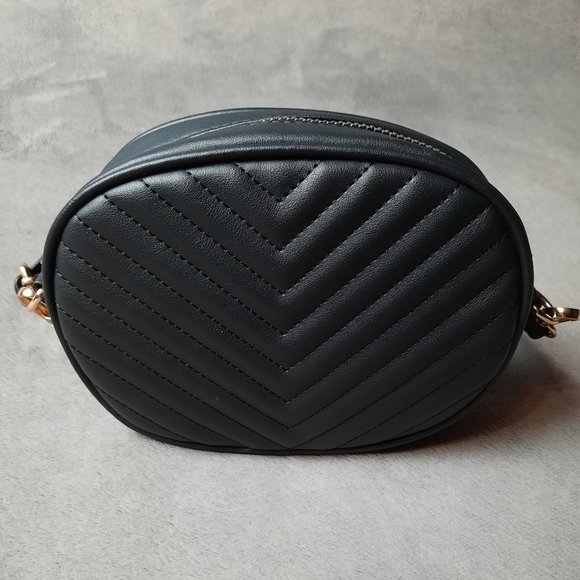 Handbags - Small black handbag.